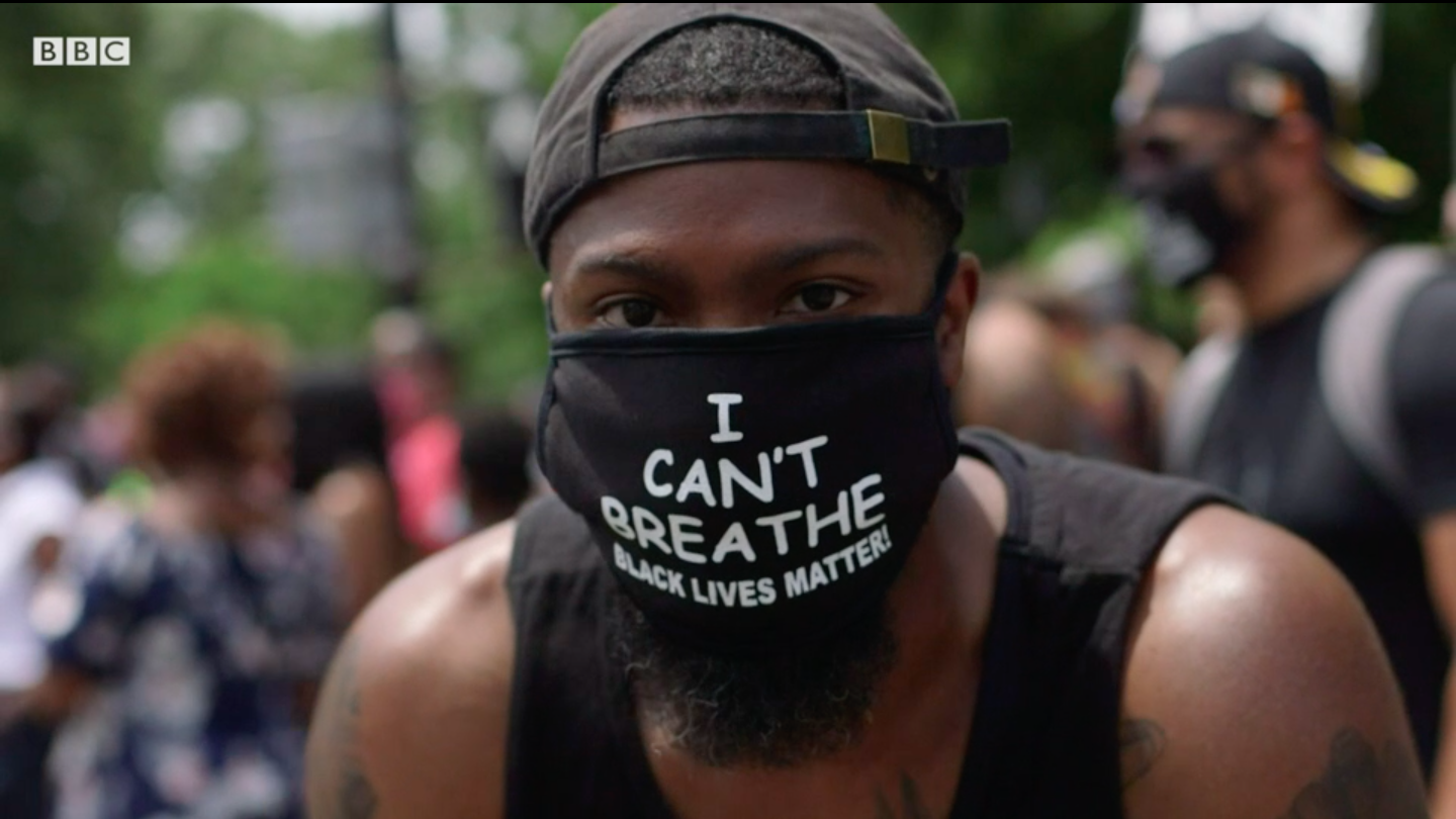 Eric Wood, a protester, wearing a mask that reads "I can't breathe"